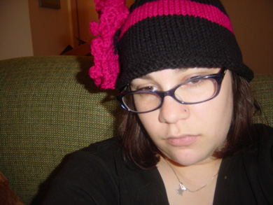 free form crochet flower with no pattern and a gigantic size, the stripe is too high up, etc etc etc.  but i think i like it.